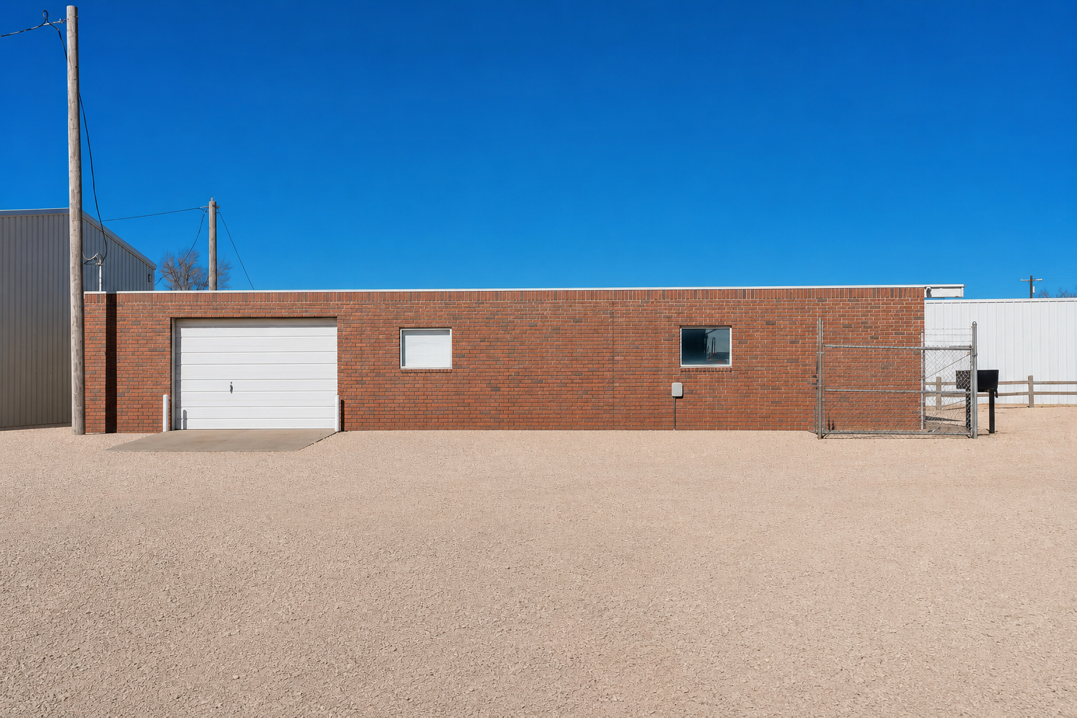 Side exterior view of 5120 N Prince #1 at North Prince Business Park